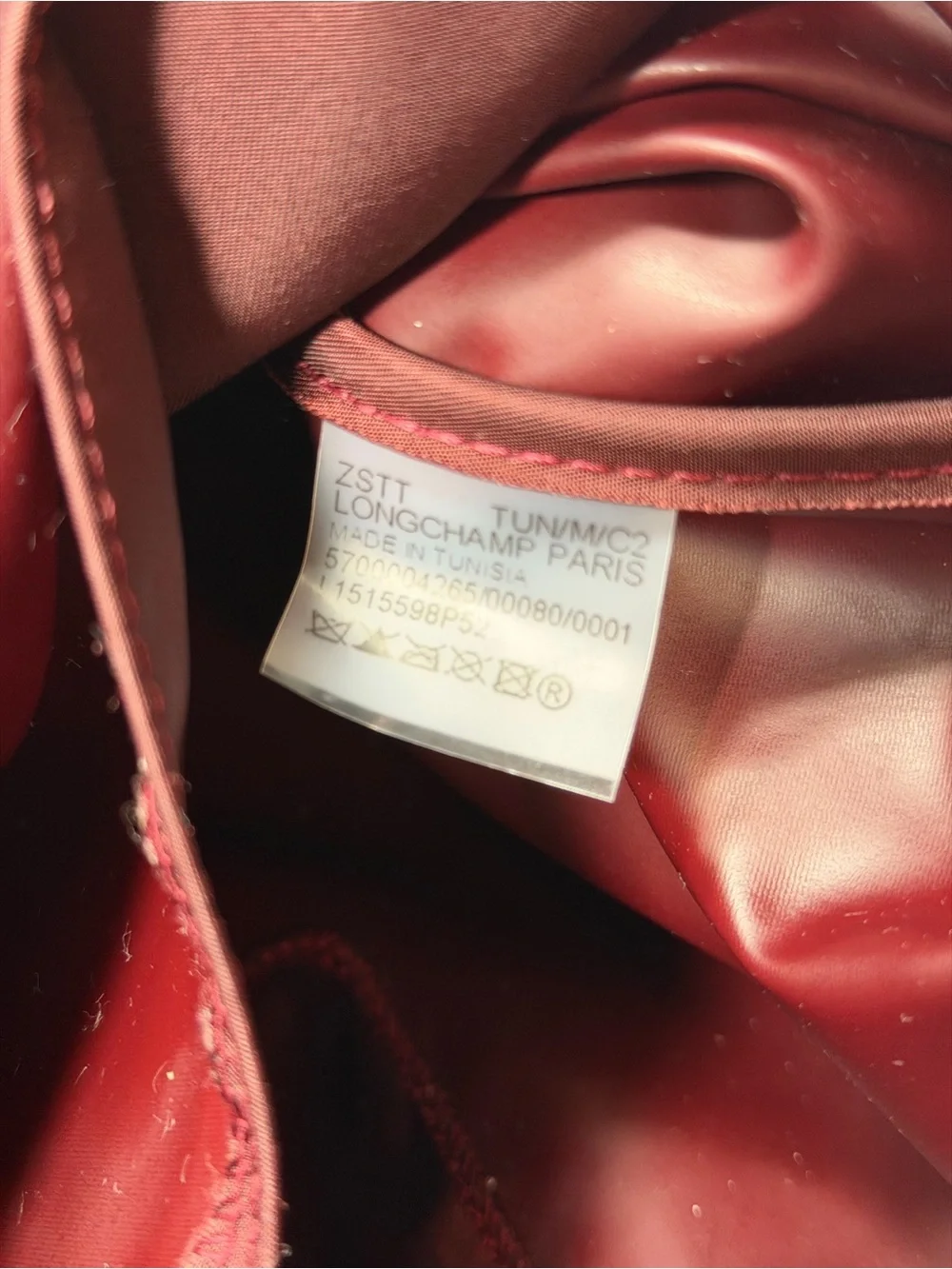 LONGCHAMP Burgundy medium Le Pliage tote from LONGCHAMP featuring leather trim